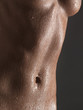 Close-up of wet nude woman, studio shot