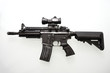 Heavily used military M16 rifle with short barrel
