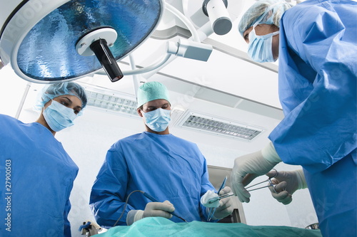 Photo: Medical personnel in operating room Medical personnel in operating room