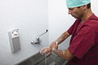 Surgeon scrubbing hands
