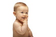 Portrait of little boy with finger in mouth (isolated on white)