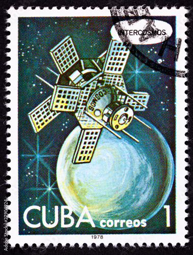 Photo: Cuban Post Stamp Intercosmos Satellite Orbiting Planet in Space Cuban Post Stamp Intercosmos Satellite Orbiting Planet in Space