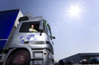 Truck driver driving semi-truck