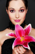 attractive woman with pink flower