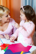 Mother and the daughter сut figures from a colour paper