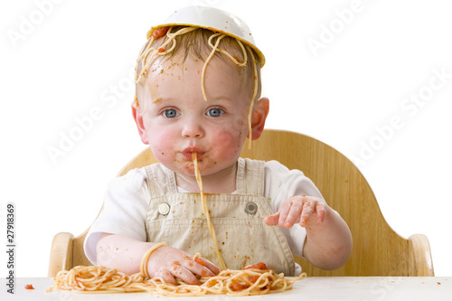 Photo: Messy baby playing with spaghetti Messy baby playing with spaghetti