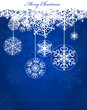 Christmas blue background with snowflakes