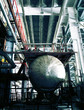 Equipment, cables and piping as found inside of a modern industr