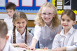 School girls smiling in classroom