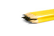 yellow pencils on a white background