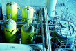 Equipment, cables and piping as found inside of a modern industr