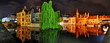 Panorama of old buildings and canal  in th night Brugge