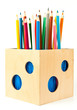 Pencils in holder over white