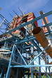 cranes and beams on construction of industrial factory
