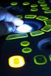 human hand on the control panel of ultrasound machine