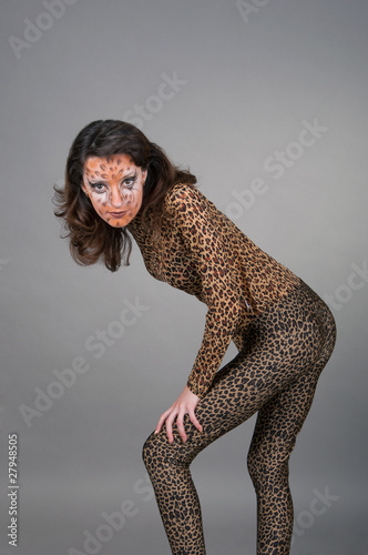 Photo: Portrait of girl with leopard's face-art Portrait of girl with leopard's face-art