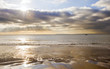 Stunning inspirational sunset image with glowing sun beams