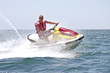 Images : Young guy cruising on the atlantic ocean on a jet ski