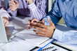 Hands of office workers working on laptop