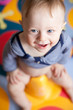 Cute baby-boy sitting on a potty