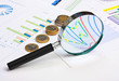 magnifying glass and the working pape magnifying glass and the working pape
