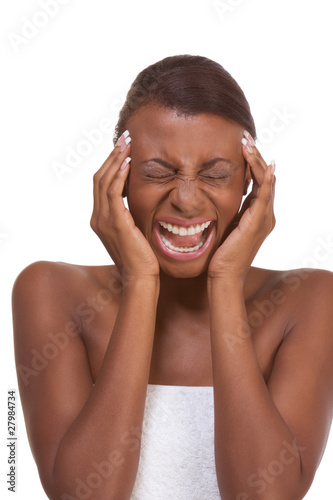 Photo: Young attractive woman suffering from headache Young attractive woman suffering from headache