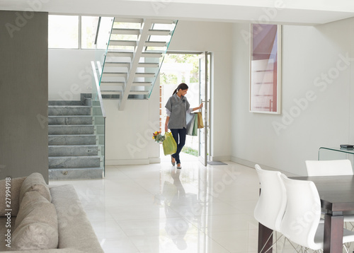 Photo: Pretty woman home from shopping Pretty woman home from shopping