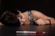 Drug addict woman with syringe is syringe is sleeping on table Drug addict woman with syringe is syringe is sleeping on table