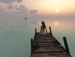 woman sitting on pier at sunrise woman sitting on pier at sunrise