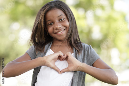 Photo: Child making a heart Child making a heart