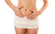 Woman massaging pain belly isolated on white Woman massaging pain belly isolated on white
