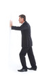 Isolated portrait of a senior business man pushing