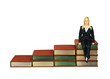 Woman sitting on books