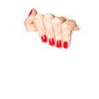 Beautiful female hand with red nails holding a blank sign