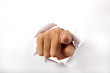 hand break through the white paper