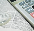Magnifying glass, a calculator