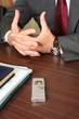 Hands of businessman giving an interview being recorded