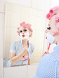 Attractive girl is having a shave