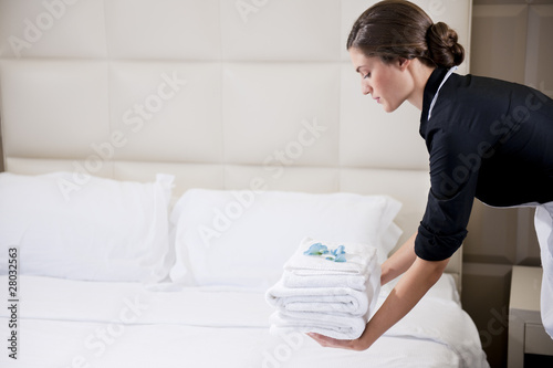 Photo: Maid Making Bed Maid Making Bed