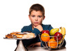 a boy's choice of a healthy or unhealthy snack