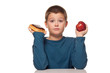 a boy's choice of a healthy or unhealthy snack
