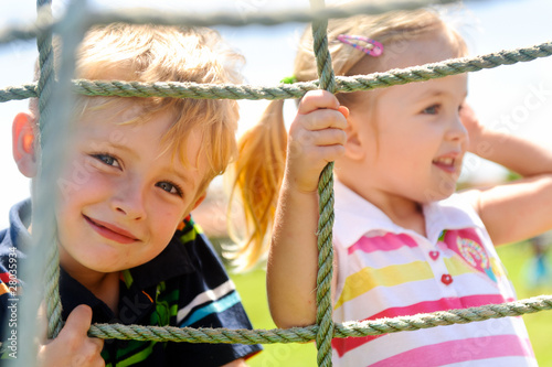 Photo: Siblings playing Siblings playing