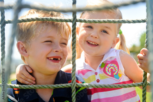 Photo: Siblings playing Siblings playing