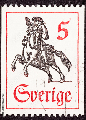 Photo: Postage Stamp Horseback Mail Delivery, Rider Blowing Postal Horn Postage Stamp Horseback Mail Delivery, Rider Blowing Postal Horn