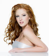 Photo: Beautiful red-haired woman with long wavy hairs Beautiful red-haired woman with long wavy hairs