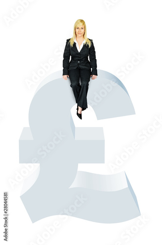 Photo: Business woman sitting on pound symbol Business woman sitting on pound symbol