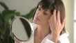 Video: Woman looking herself in the mirror; HD 720, H 264 Woman looking herself in the mirror; HD 720, H 264