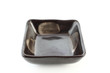 apanese ceramic bowl for  sauce. On white paper.