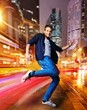 Stylish young dancer in the night city