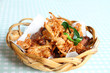 Thai style food, fried chicken with herb.